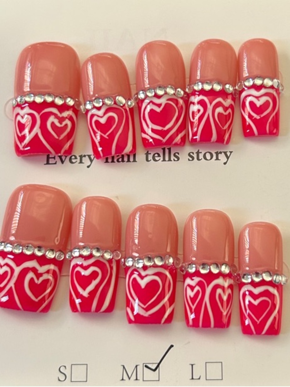 Pink Nude Press-On Nails with Red Heart Tips and Rhinestones